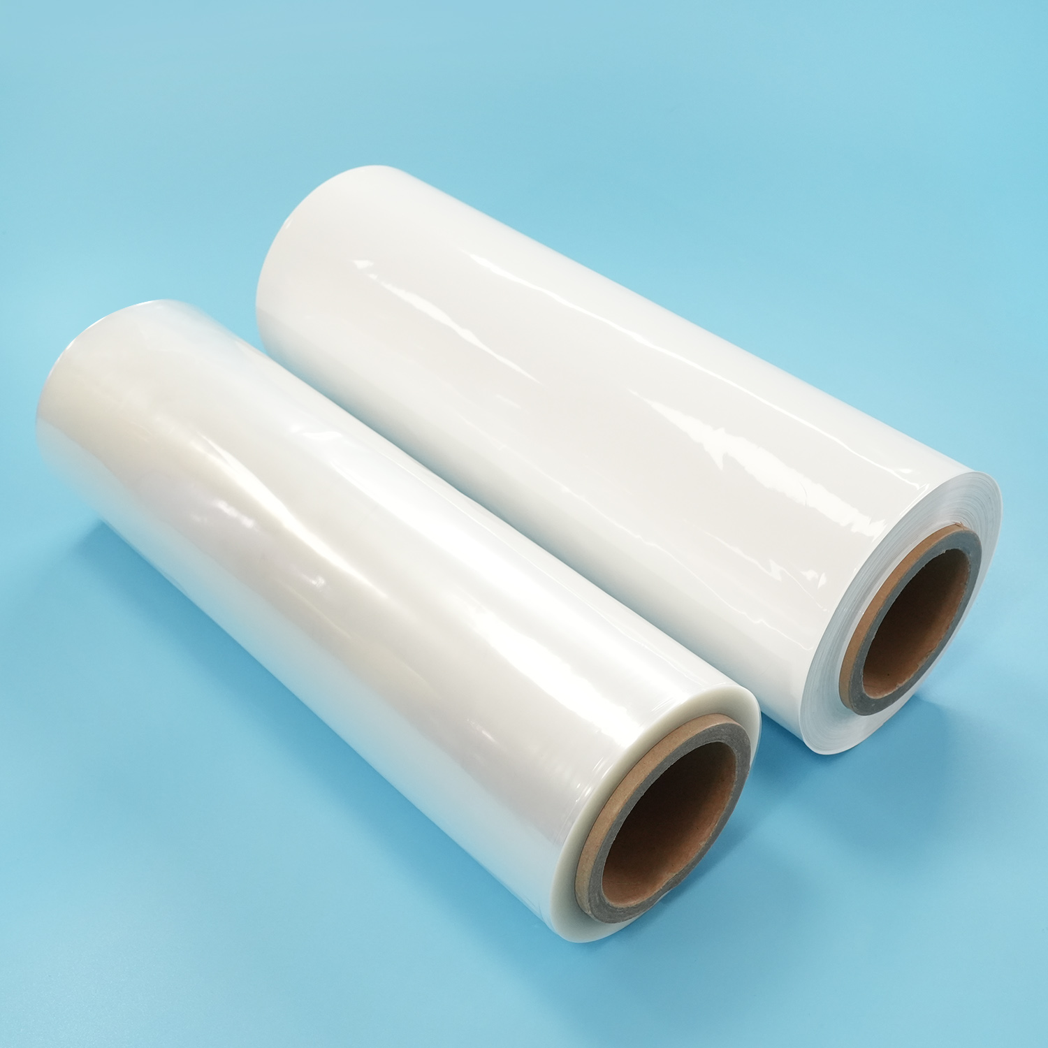 Película termorretráctil de poliolefina reticulada de grado alimenticio impresa personalizada, película retráctil POF transparente flexible con fuerte contracción para alimentos, bebidas y embalaje exterior de productos en general